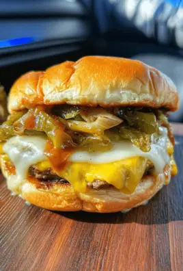 Double Cheeseburger-Stuffed Onion Bombs with Fiery Green Chilis & Smoky Chipotle Sauce